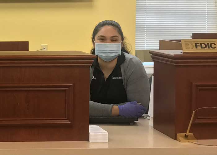 Freedom Bank of Virginia: Bank Teller in Masks and Gloves