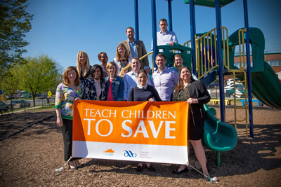 ABA staff give presentations at a school in Washington, D.C. for Teach Children to Save Day 2019.